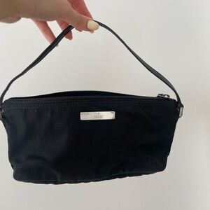 Authentic Gucci Black Nylon Pouch with Silver Logo Plaque